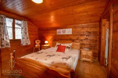 Ein Bett oder Betten in einem Zimmer der Unterkunft Cosy Chalet in Brig-Glis