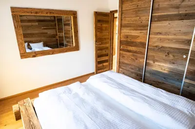 Ein Bett oder Betten in einem Zimmer der Unterkunft Modernity and authenticity in Crans-Montana, breathtaking panorama
