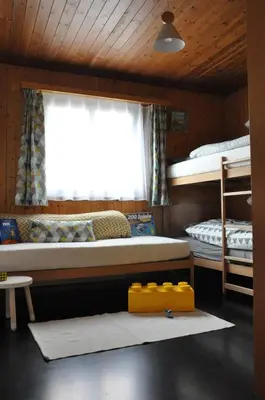 Ein Bett oder Betten in einem Zimmer der Unterkunft Chalet Bietschhorn Rosswald