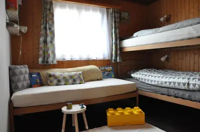 Ein Bett oder Betten in einem Zimmer der Unterkunft Chalet Bietschhorn Rosswald