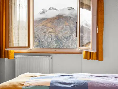 Ein Bett oder Betten in einem Zimmer der Unterkunft Apartment Heimine by Interhome