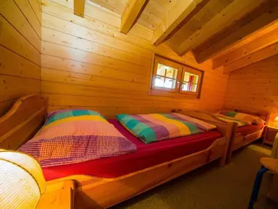 Ein Bett oder Betten in einem Zimmer der Unterkunft Apartment Stubulti by Interhome