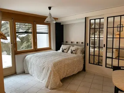 Ein Bett oder Betten in einem Zimmer der Unterkunft Studio Brunnmatt