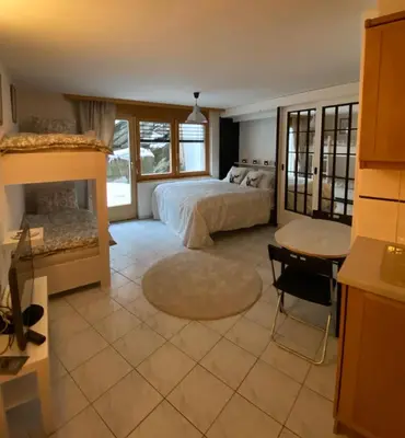 Ein Bett oder Betten in einem Zimmer der Unterkunft Studio Brunnmatt