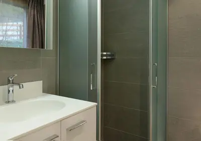 Ein Badezimmer in der Unterkunft Apartment Superior Parrot