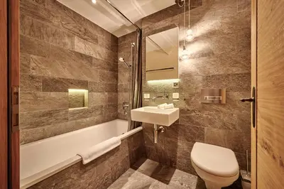 Ein Badezimmer in der Unterkunft The Grindelwald Penthouse - GRINDELHOMES
