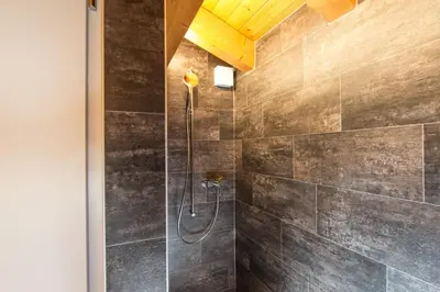 Ein Badezimmer in der Unterkunft Chalet Sunneblick
