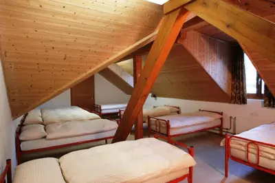 Ein Bett oder Betten in einem Zimmer der Unterkunft Wild Valley Rustico Grande