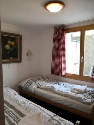 Ein Bett oder Betten in einem Zimmer der Unterkunft Chalet Valaisia
