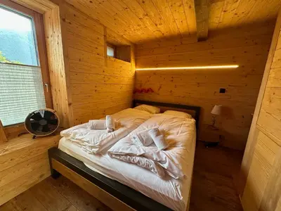 Ein Bett oder Betten in einem Zimmer der Unterkunft Charmant chalet authentique de montagne Bleusy- Nendaz idéal couple et famille