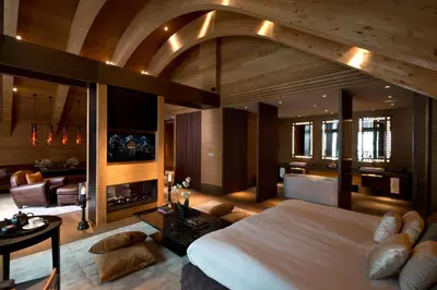 Ein Bett oder Betten in einem Zimmer der Unterkunft The Chedi Andermatt