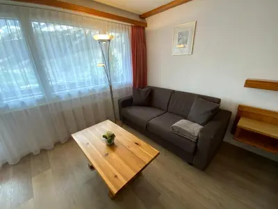 Ein Sitzbereich in der Unterkunft Alfa Appartements Superior