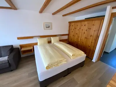 Ein Bett oder Betten in einem Zimmer der Unterkunft Alfa Appartements Superior