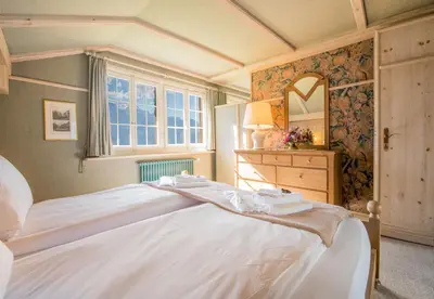 Ein Bett oder Betten in einem Zimmer der Unterkunft Chalet Irene