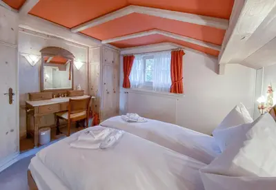 Ein Bett oder Betten in einem Zimmer der Unterkunft Chalet Irene