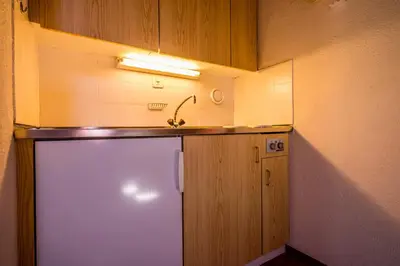 Küche/Küchenzeile in der Unterkunft Appartement cosy au centre de Grimentz