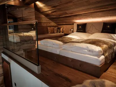 Ein Bett oder Betten in einem Zimmer der Unterkunft Apartment Galaxy Lodge by Interhome