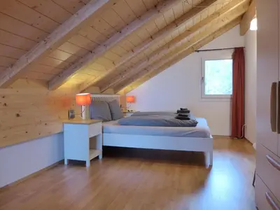 Ein Bett oder Betten in einem Zimmer der Unterkunft Apartment Momento by Interhome
