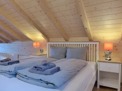 Ein Bett oder Betten in einem Zimmer der Unterkunft Apartment Momento by Interhome