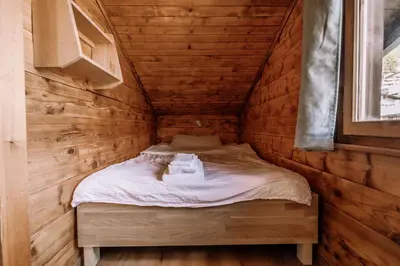 Ein Bett oder Betten in einem Zimmer der Unterkunft Hotel Les Amis