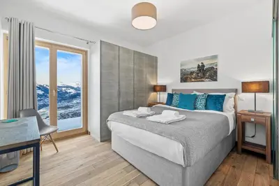 Ein Bett oder Betten in einem Zimmer der Unterkunft Chalet Ibex, à côté de la piste de Veysonnaz