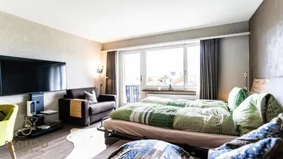 Ein Bett oder Betten in einem Zimmer der Unterkunft Haus Rhodania mit Matterhornblick, Riederalp Mitte