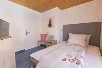 Ein Bett oder Betten in einem Zimmer der Unterkunft Swiss Mountains Apartments