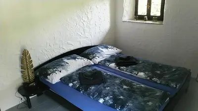Ein Bett oder Betten in einem Zimmer der Unterkunft Residenza Americana