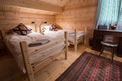 Ein Bett oder Betten in einem Zimmer der Unterkunft Chalet PapaGna