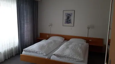 Ein Bett oder Betten in einem Zimmer der Unterkunft FeWo Fernsicht Crystal