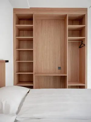 Ein Bett oder Betten in einem Zimmer der Unterkunft Sport Resort Fiesch, Garni Goneri