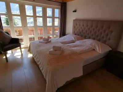 Ein Bett oder Betten in einem Zimmer der Unterkunft Chalet M
