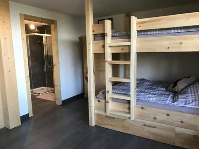 Ein Bett oder Betten in einem Zimmer der Unterkunft CHEZ FOLLO