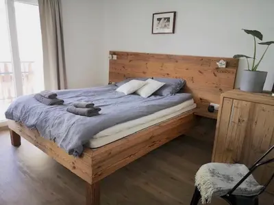 Ein Bett oder Betten in einem Zimmer der Unterkunft Apartment Cristal