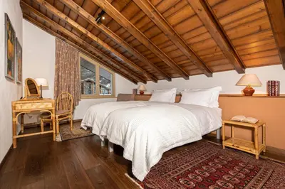 Ein Bett oder Betten in einem Zimmer der Unterkunft Penthouse Zen Zermatt, 100m from Ski Lift and Piste