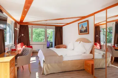 Ein Sitzbereich in der Unterkunft Hotel Beau Rivage