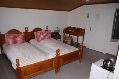 Ein Bett oder Betten in einem Zimmer der Unterkunft Baeren Hotel, The Bear Inn