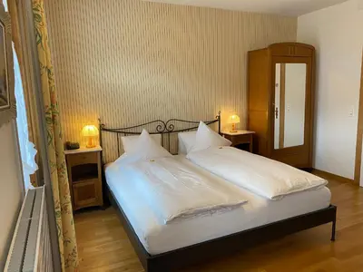 Ein Bett oder Betten in einem Zimmer der Unterkunft Carlton-Europe Vintage Adults Hotel