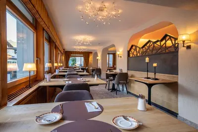Ein Sitzbereich in der Unterkunft Hotel Kreuz & Post Grindelwald