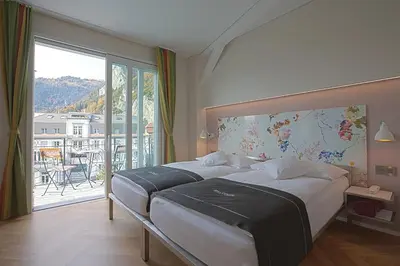 Ein Bett oder Betten in einem Zimmer der Unterkunft Boutique Hotel Bellevue