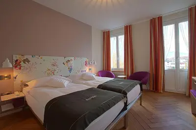 Ein Bett oder Betten in einem Zimmer der Unterkunft Boutique Hotel Bellevue