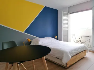 Ein Bett oder Betten in einem Zimmer der Unterkunft Studio vue imprenable
