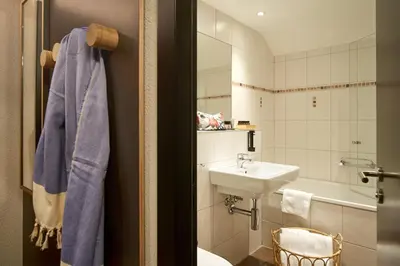 Ein Badezimmer in der Unterkunft The HEY HOTEL