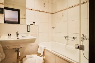 Ein Badezimmer in der Unterkunft The HEY HOTEL
