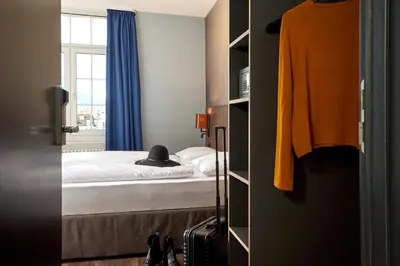 Ein Bett oder Betten in einem Zimmer der Unterkunft The HEY HOTEL