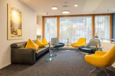 Ein Sitzbereich in der Unterkunft Stella Swiss Quality Hotel