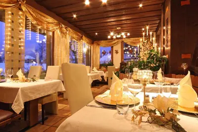 Ein Restaurant oder anderes Speiselokal in der Unterkunft Bernerhof Swiss Quality Hotel