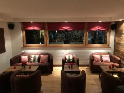 Ein Sitzbereich in der Unterkunft Le Chalet Victoria
