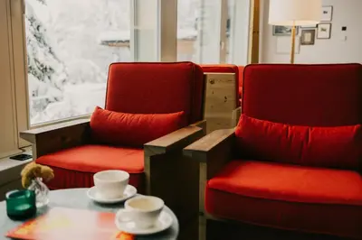 Ein Sitzbereich in der Unterkunft Grand Hotel Belvedere, a Beaumier Hotel