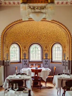 Ein Restaurant oder anderes Speiselokal in der Unterkunft Grand Hotel Belvedere, a Beaumier Hotel